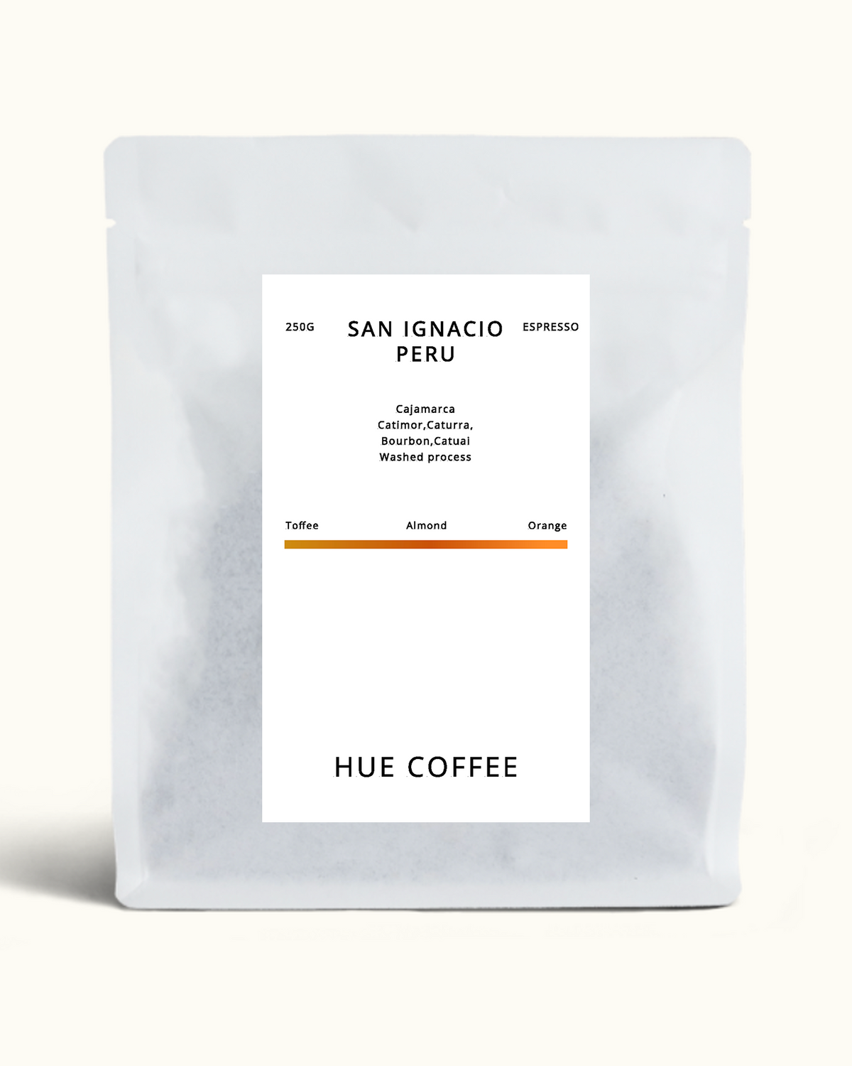 A matte white coffee bag with a minimalist white label reading 'SAN IGNACIO PERU' and 'HUE COFFEE', photographed on a clean off-white background.